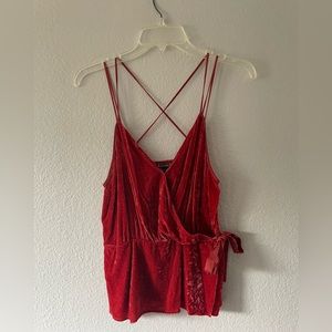 Red/ burnt orange felt-like top. From express.